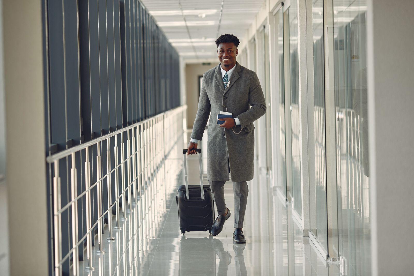 Business traveller heading through the airport for a work trip